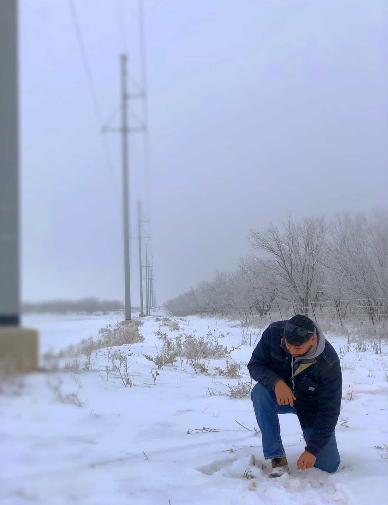 Jude Jolma visiting the gravesite of Henry Miller, honoring the legacy of the International Brotherhood of Electrical Workers.