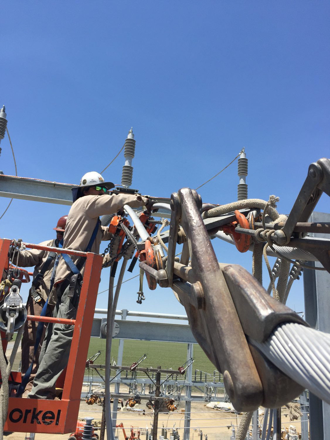 Shayla Gaffney Climbing Utility Pole in Remote Right-of-Way