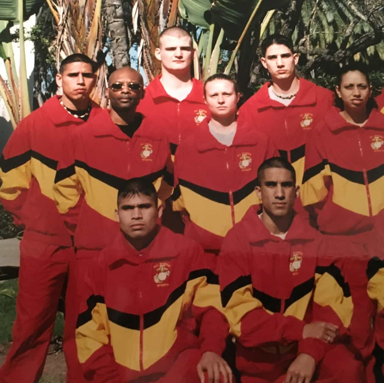 Jude Jolma smiling with his daughter at a community lineman event