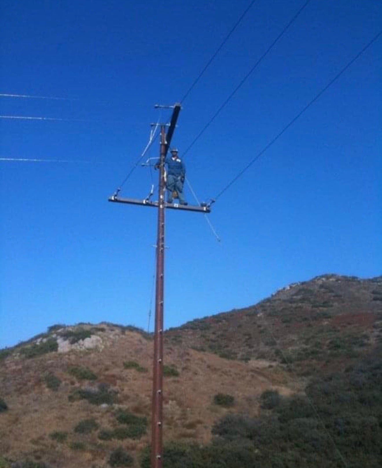 Jude Jolma driving with his two children, enjoying family time together on the road