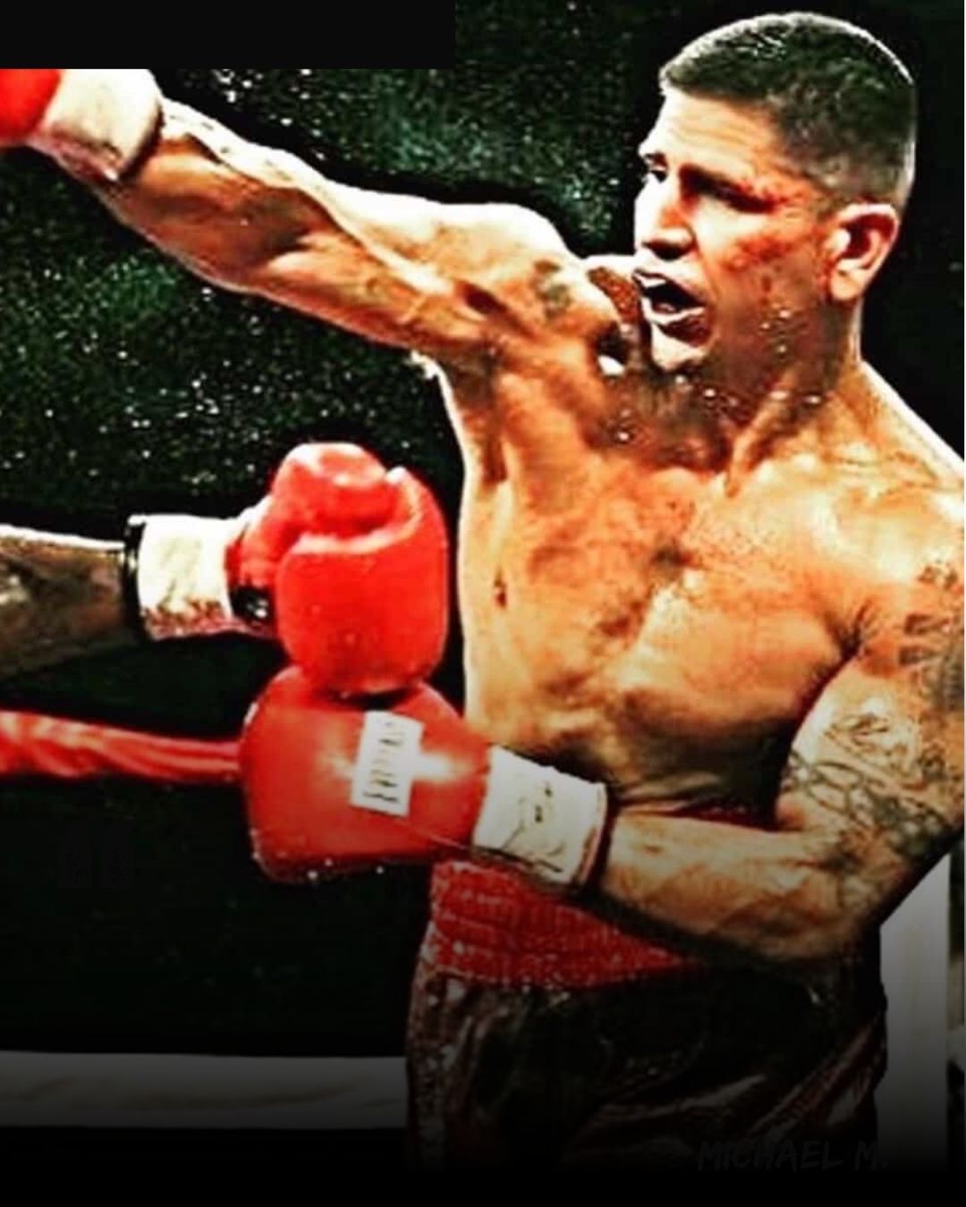 Johnny Garcia smiling in a military uniform