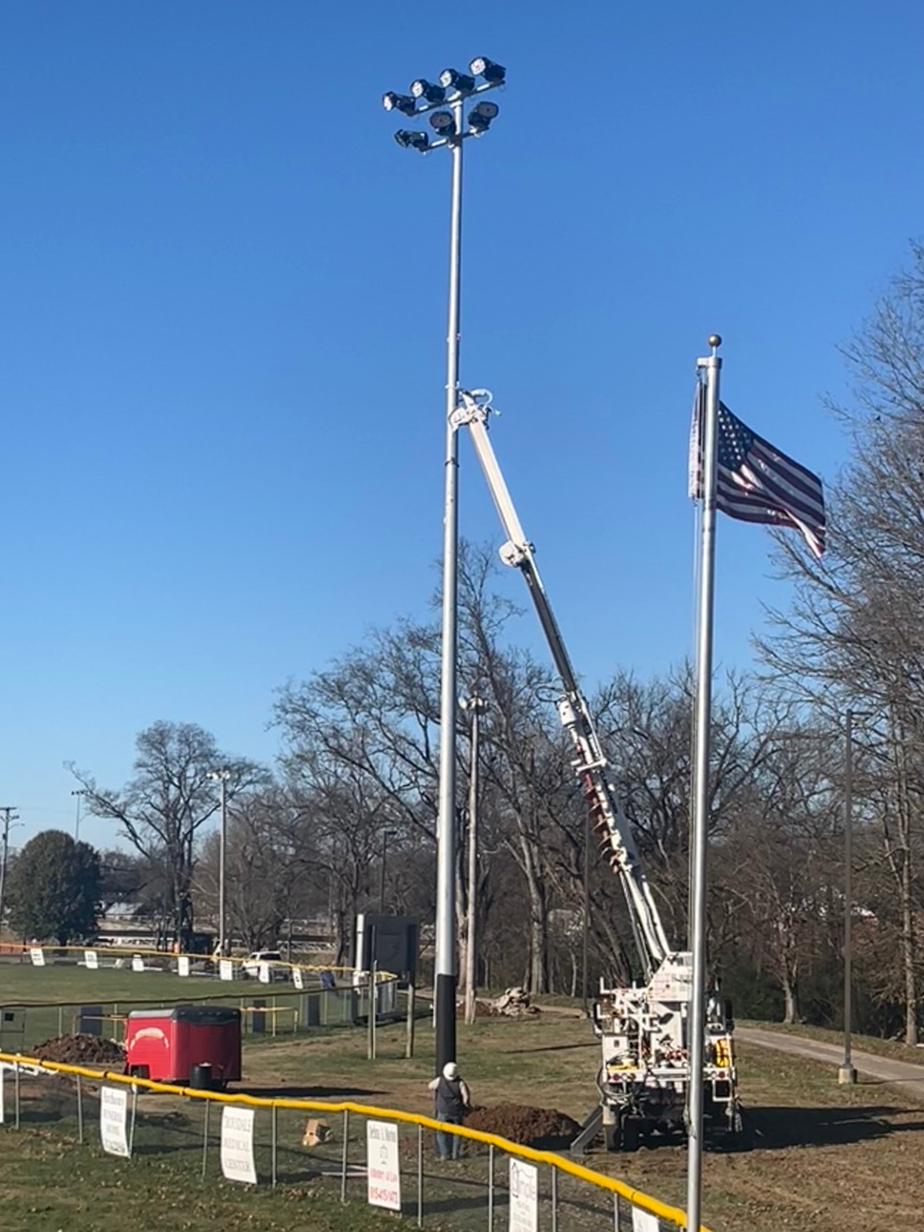 Shayla Gaffney Climbing Utility Pole in Remote Right-of-Way